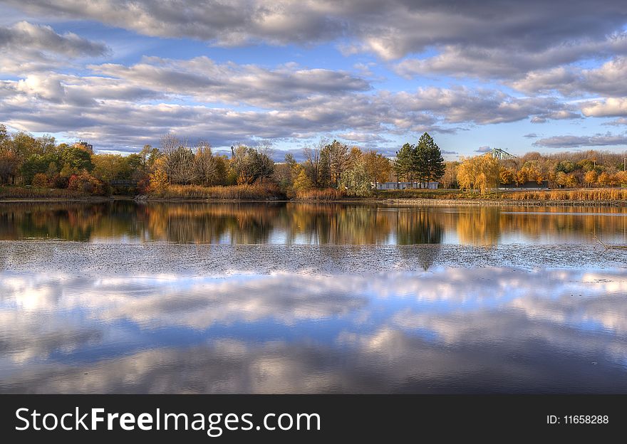 Panoramic view of a lake with a symetrical effect. Panoramic view of a lake with a symetrical effect