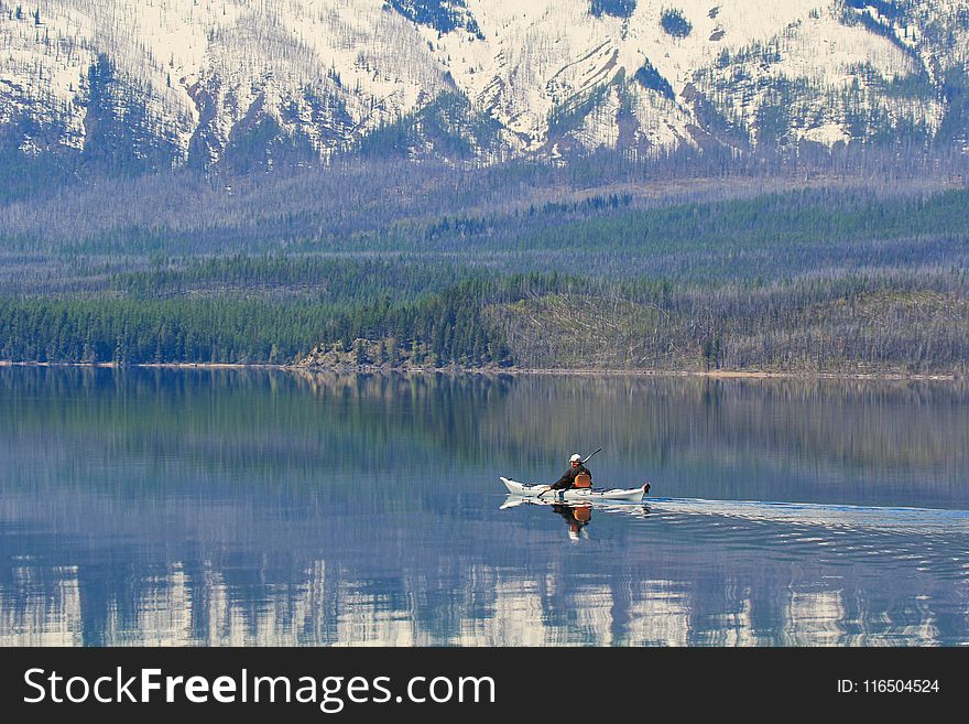 Man Riding on a Boat