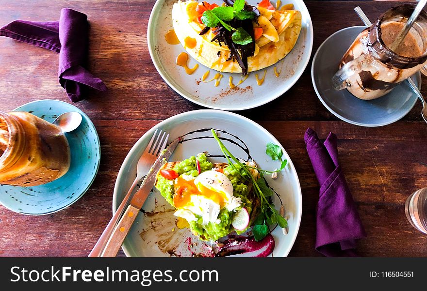 Vegetable Dish in White Plate on Brown Table