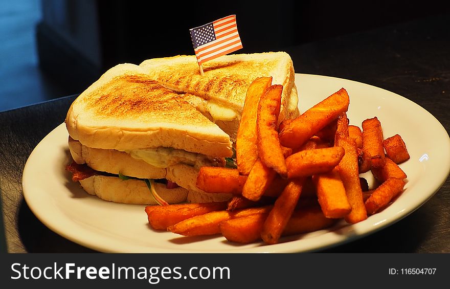 French Fries And Sandwich On White Plate