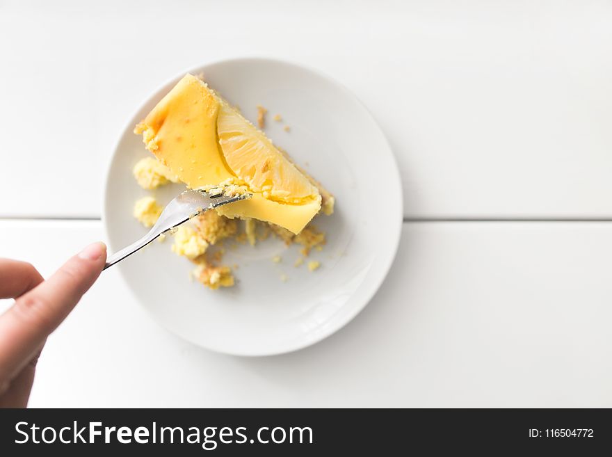 Sliced Dessert on Top of White Ceramic Plate