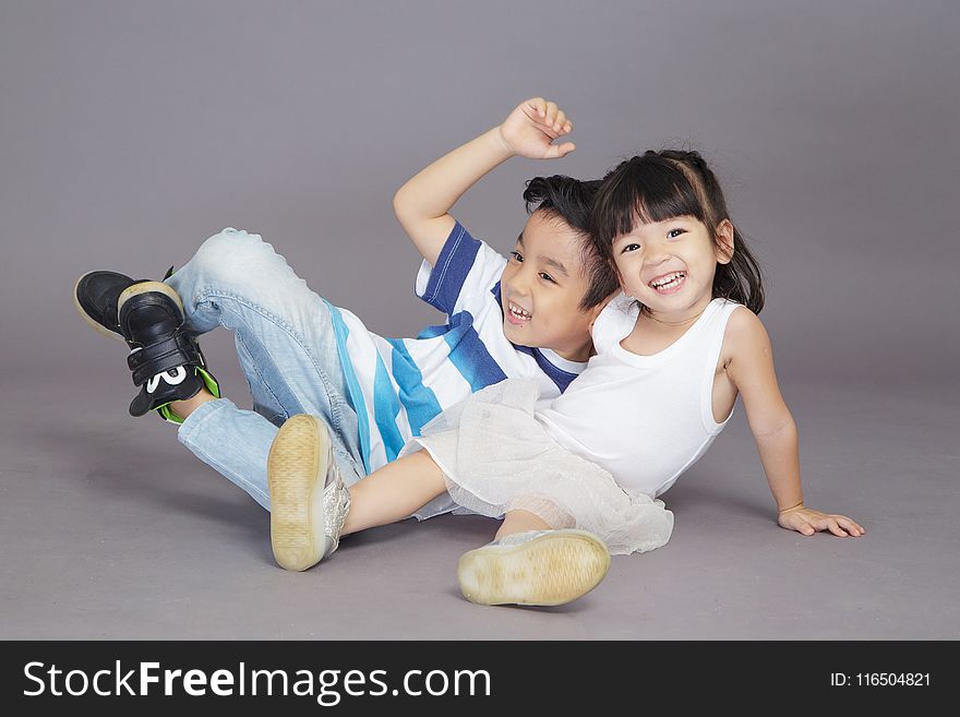 Boy and Girl Taking Picture