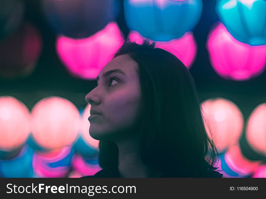 Woman in Portrait Photo With Bokeh Effect Background