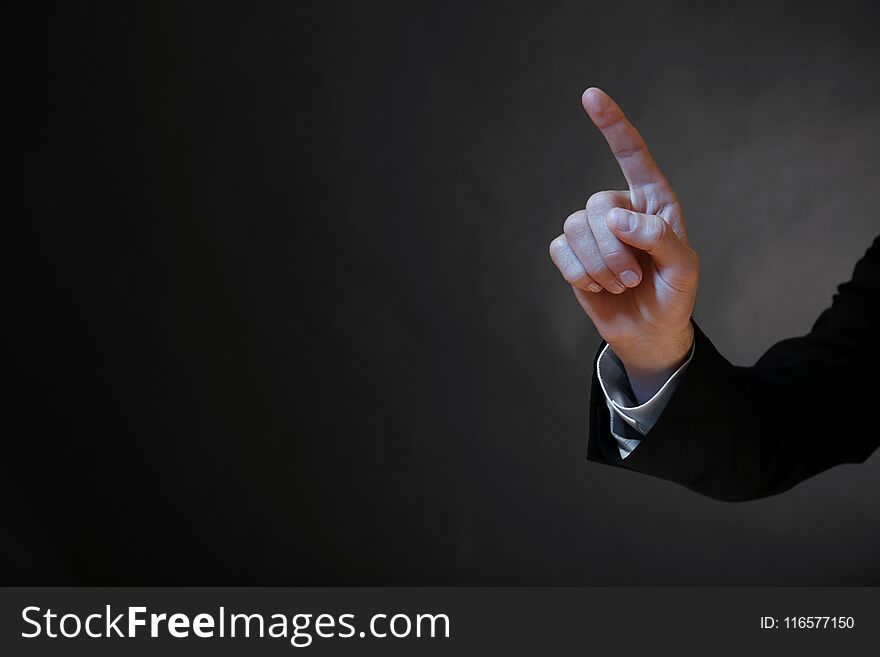 Male hand with finger pointing