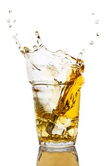 Glass Of Apple Juice With Splash Royalty Free Stock Photography