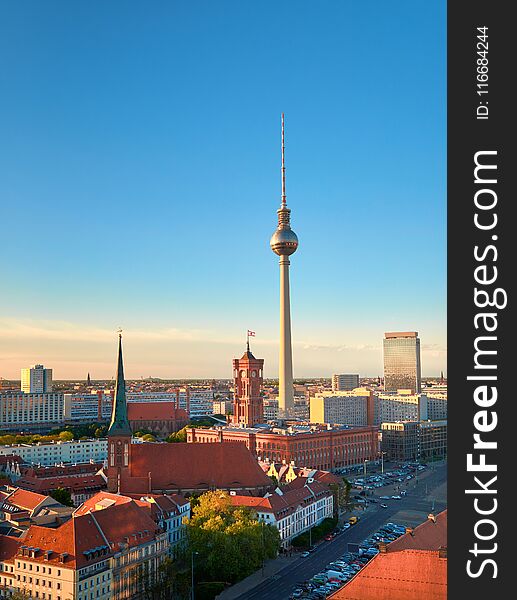 Aerial view of central Berlin on a bright day in Spring, including old City Hall and television tower on Alexanderplatz. Aerial view of central Berlin on a bright day in Spring, including old City Hall and television tower on Alexanderplatz