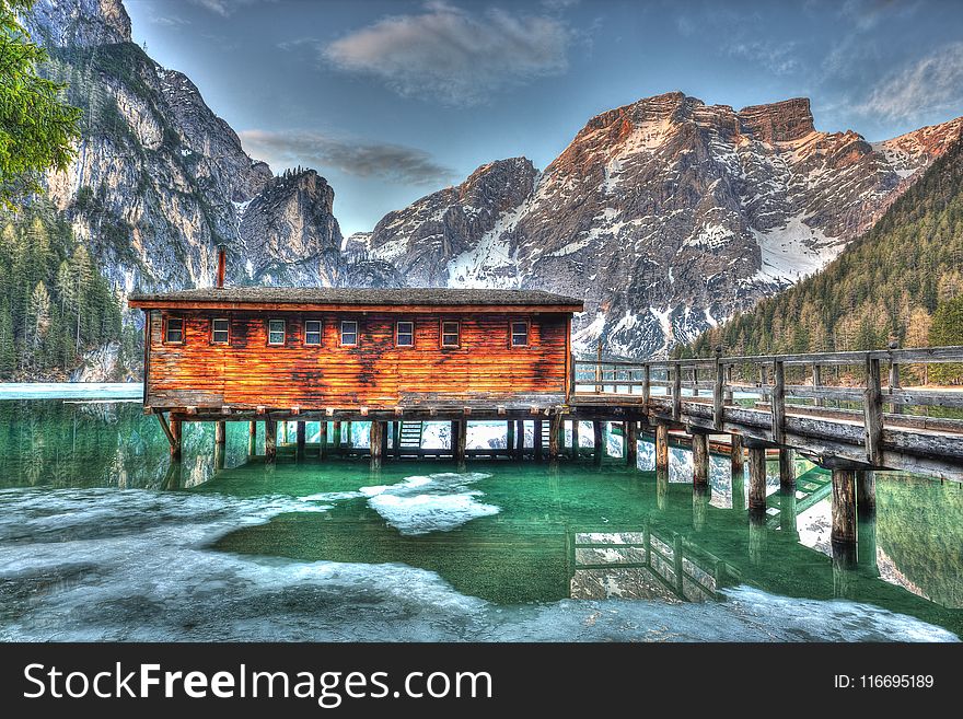 Brown Wooden House Near Mountain