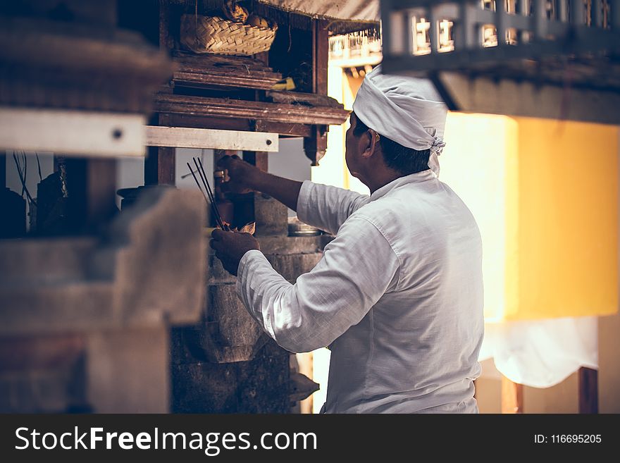 Photography Of Man On Kitchen Room