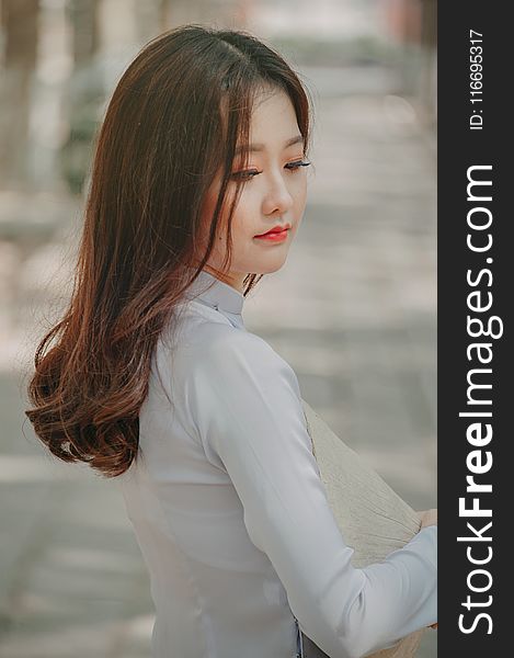 Close-up Photography Of Woman In White Top