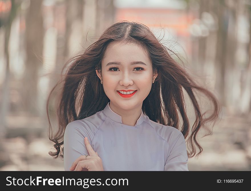 Close-Up Photography Of A Smiling Woman