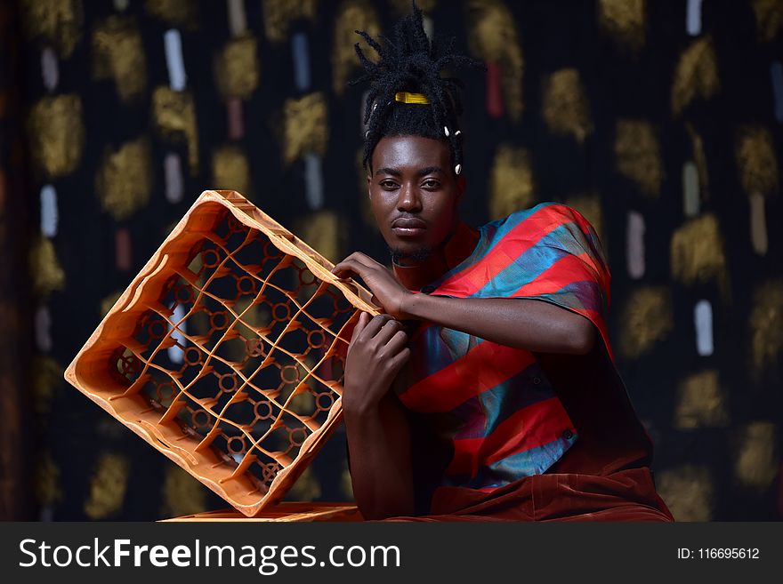 Photography of Person Holding Plastic Bottle Crate