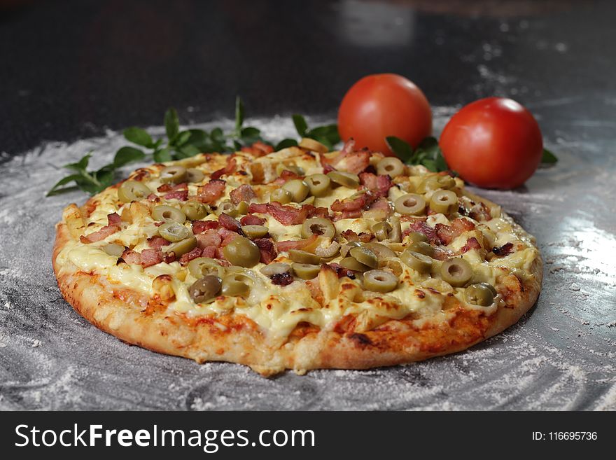 Photography of Pizza With Olive Toppings