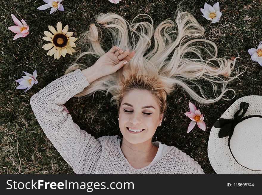 Woman Lying on Flowers
