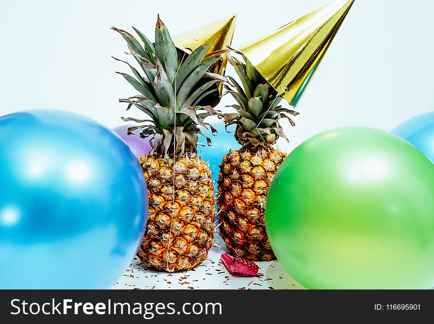 Two Pineapples And Balloons