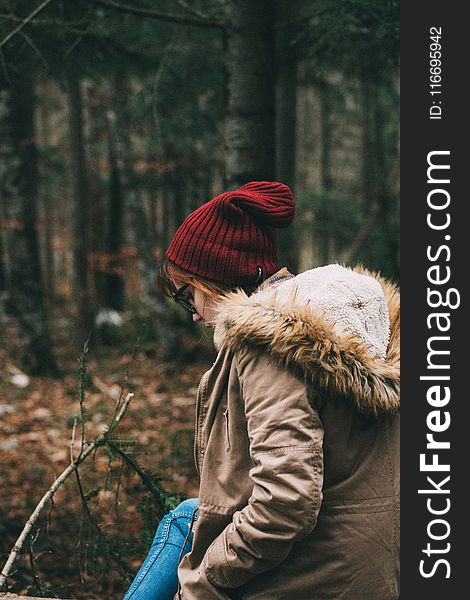 Woman Wearing Red Knit Beanie