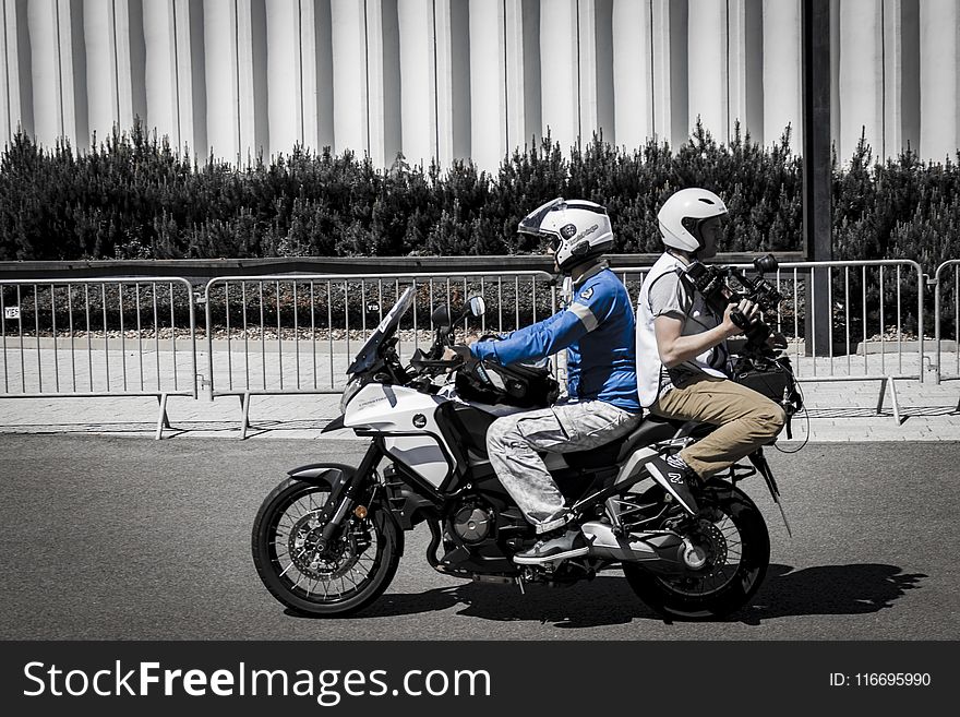 Two Men Riding Motorcycle