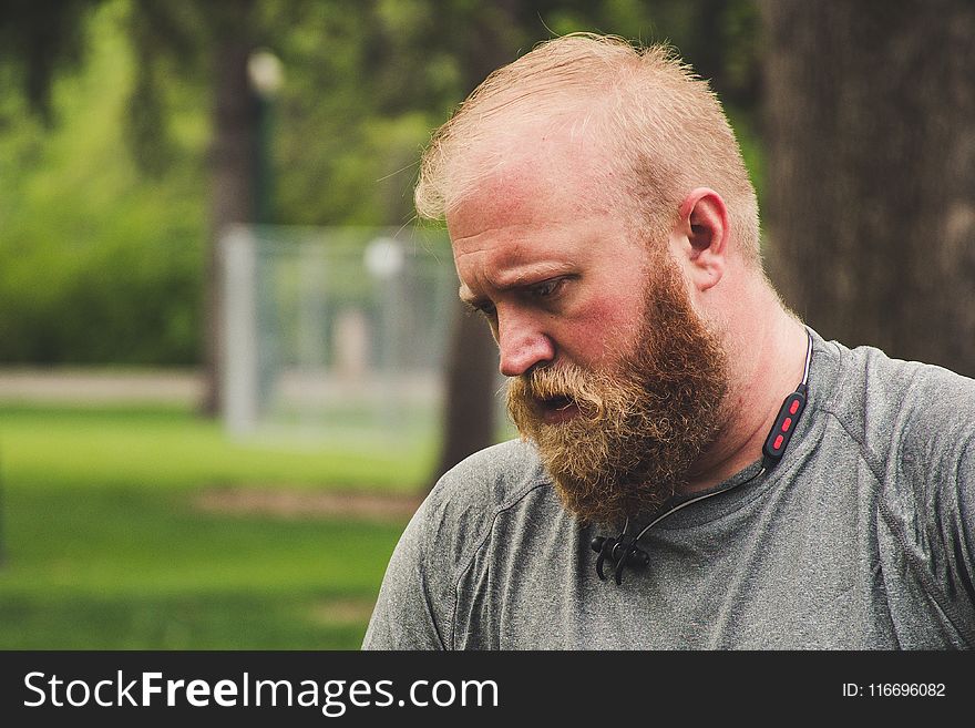 Man Wearing Grey Top