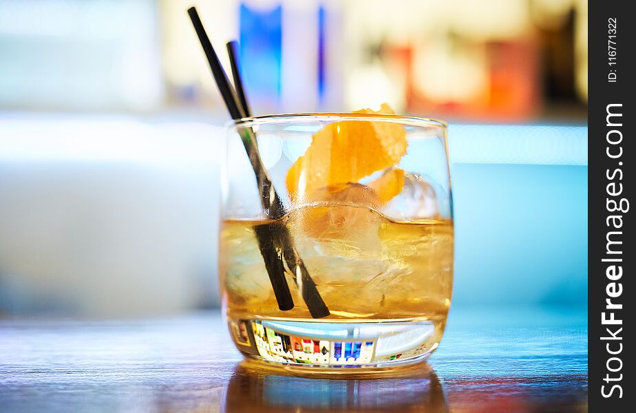 Glass with cocktail on the bar counter