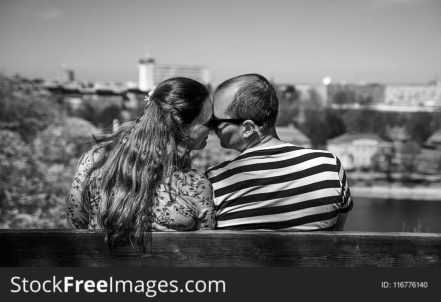 Grayscale Photo of Man and Woman