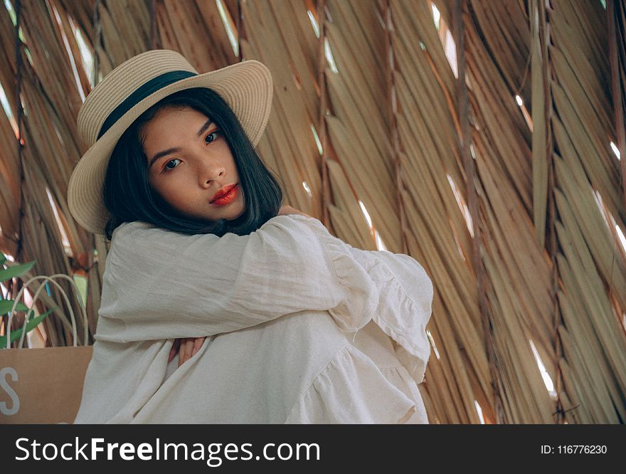 Woman Wearing Brown Hat