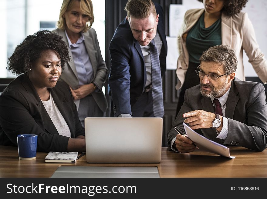Group of People in a Meeting