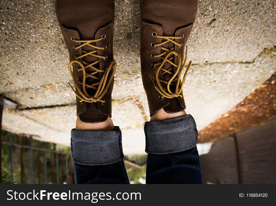 Person Wearing Brown Leather Lace-up Work Boots