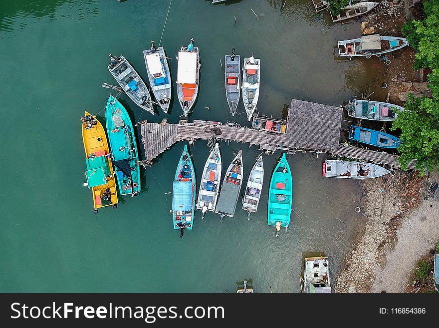 Aerial Shot Of Boats On Body Of Water