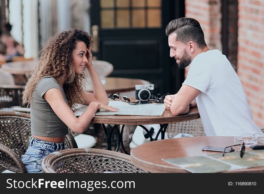 Beautiful Loving Couple Sitting In A Cafe Enjoying In Coffee