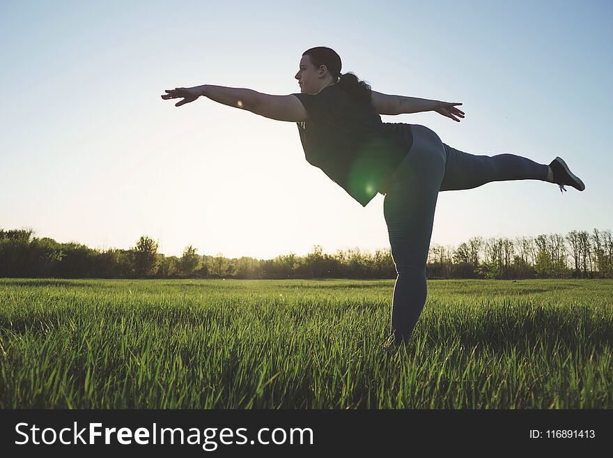 Overweight Woman Dancing Outdoors. Freedom Concept