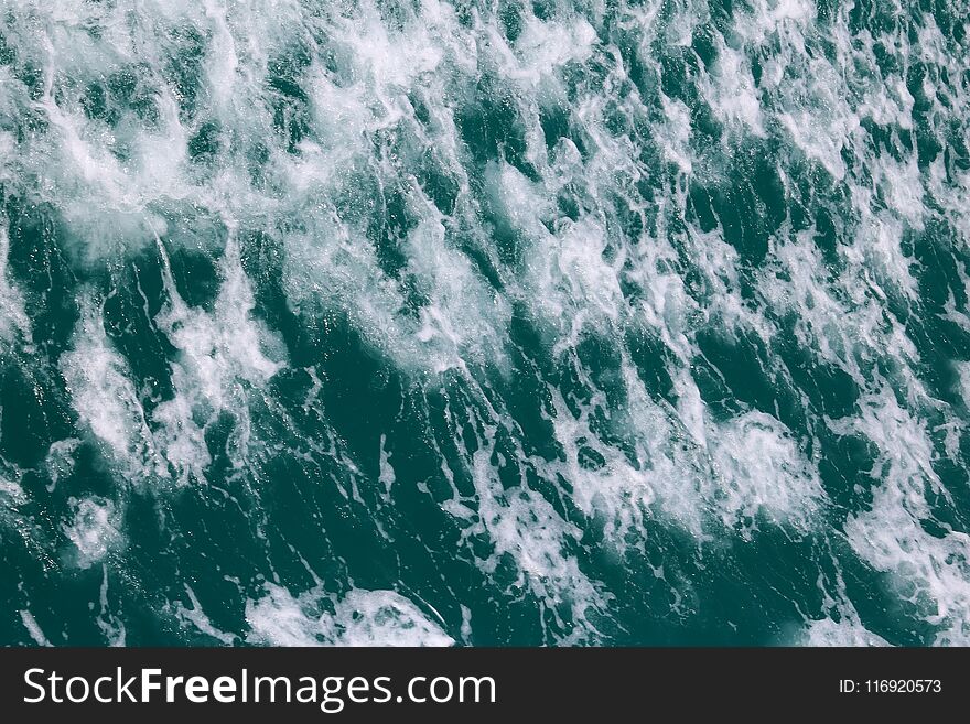 Sea Water Surface ,wave And Bubbles In The Ocean