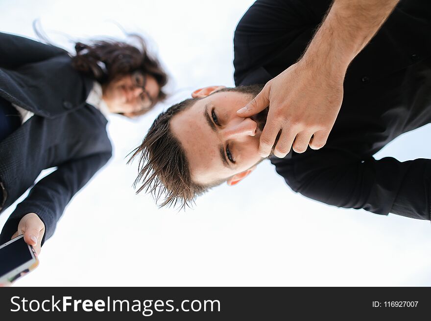 Photo From Below, Caucasian Man And Woman Wearing Black Clothes In White Background.