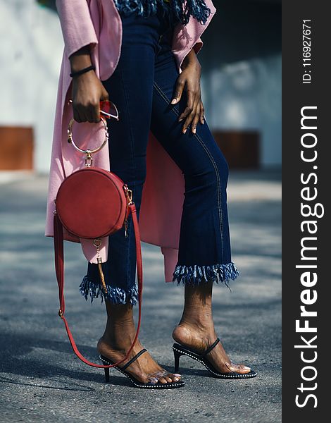 Woman Holding Round Leather 2-way Handbag