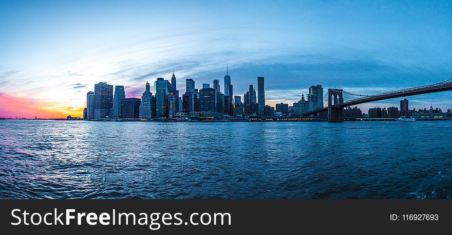 Photo Of Buildings During Dusk