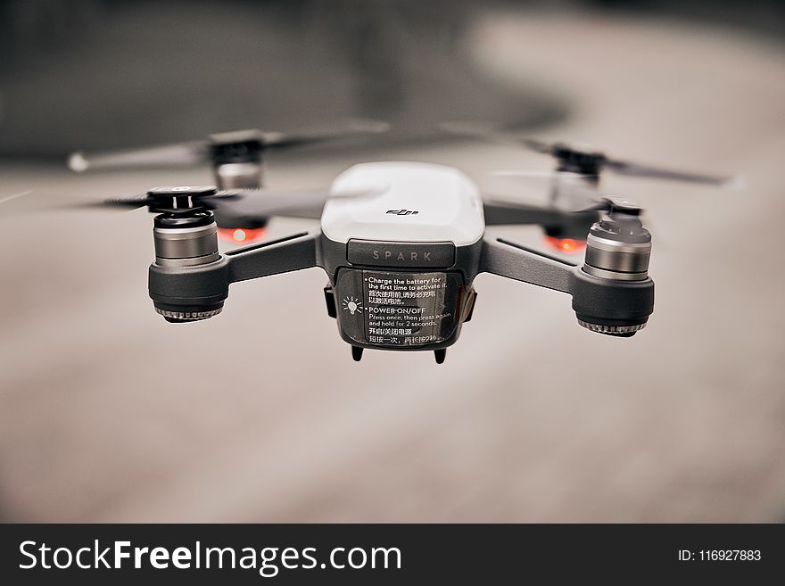 Flying White Drone Tilt Shift Lens Photography