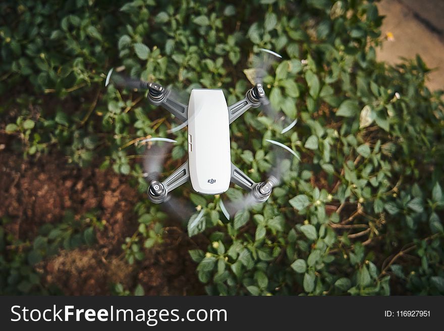 White and Gray Quadcopter Video Drone