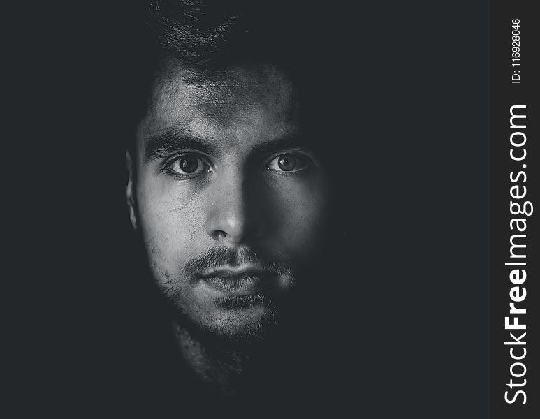 Grayscale Photo of Man&#x27;s Face