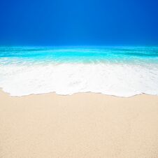 Beautiful Tropical Beach With Soft Wave Of Blue Ocean, White Sa Royalty Free Stock Images