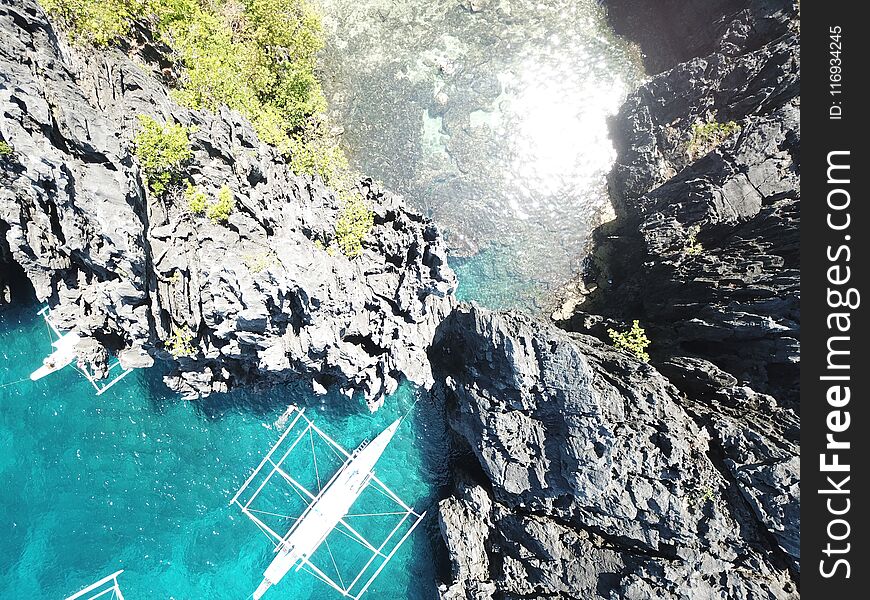 Entrance into the secret beach at El Nido Tour C, beach is hidden behind caves. Entrance into the secret beach at El Nido Tour C, beach is hidden behind caves.