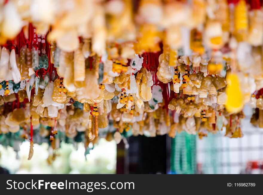 Many brown Jade necklace,foreground is blur