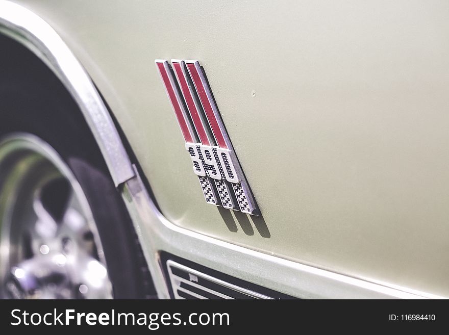 Close-Up Photography of Car Emblem