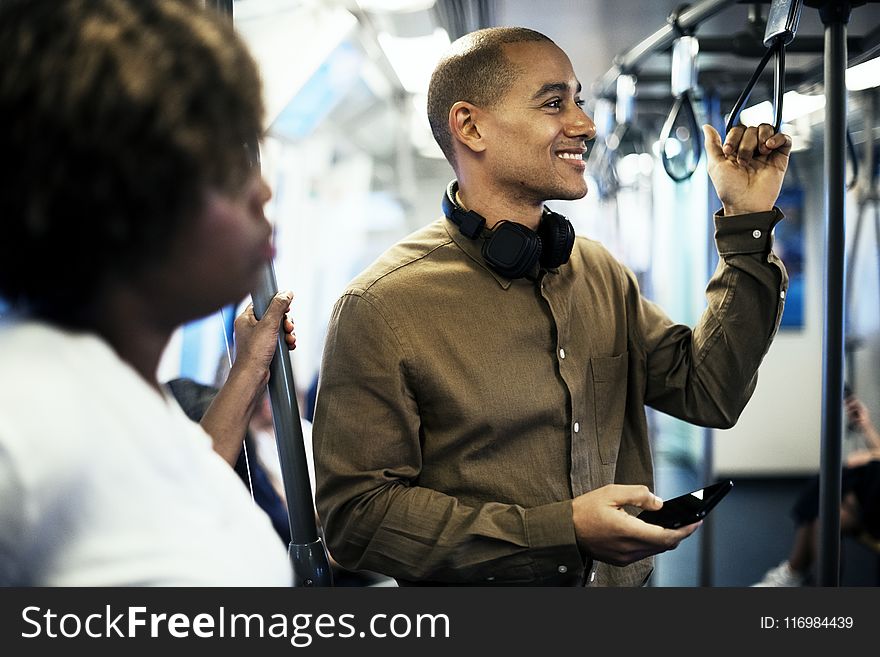 Shallow Focus Photography Of Man In Brown Dress Shirt