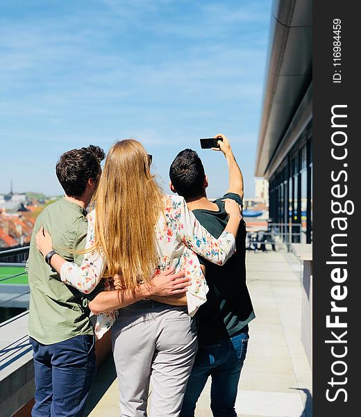 Three Person Doing Selfie Under Sunny Sky