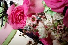 Rings Resting On The Bouquet Stock Photography