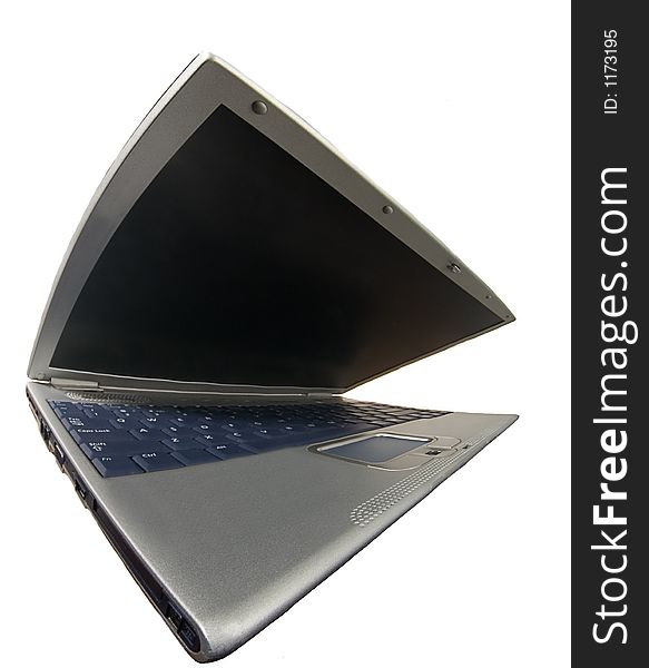 A laptop. The left-side view.