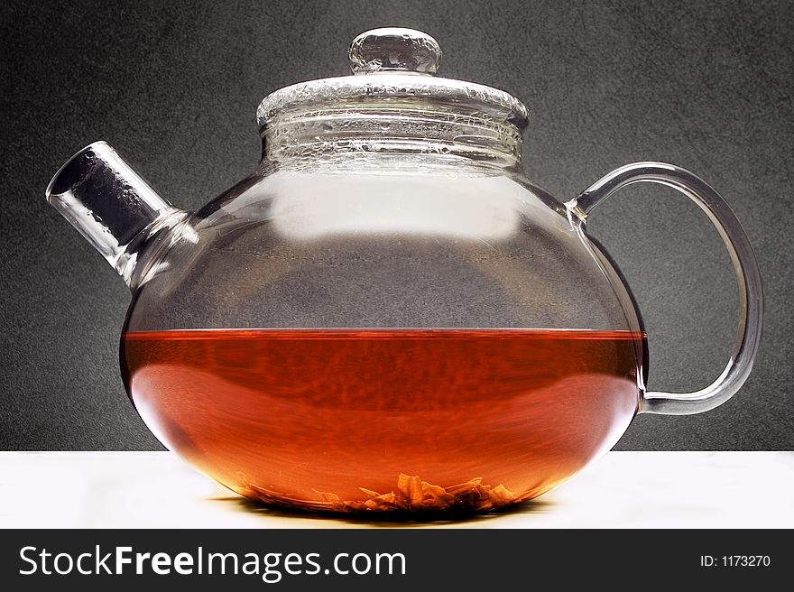 Teapot on a black background
