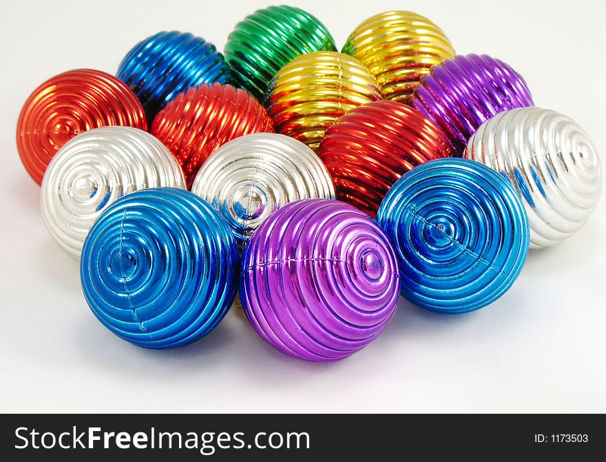 Colorful round christmas ornaments in a circle pattern