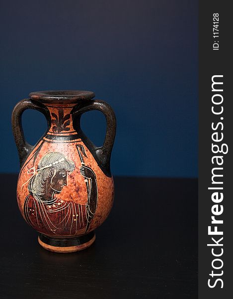 Ancient vase with a woman painted on it