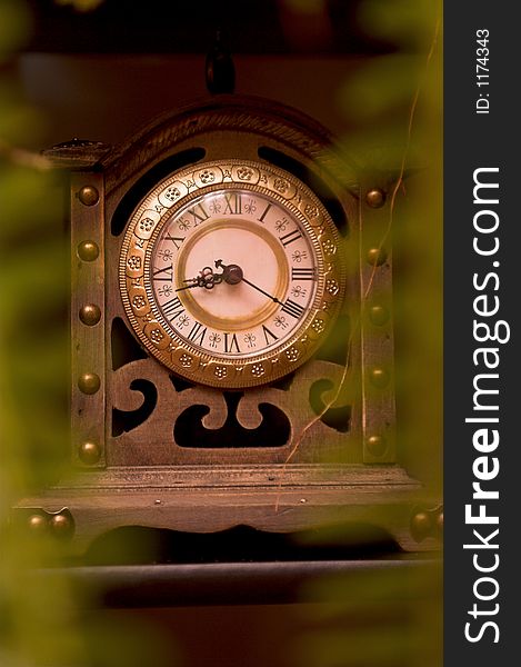 Old wooden clock showing time. Old wooden clock showing time
