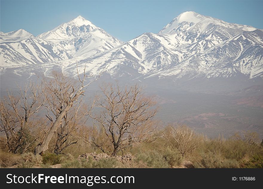 Two snow-covered mountain peaks in the argentine Andes, San Juan province. Two snow-covered mountain peaks in the argentine Andes, San Juan province