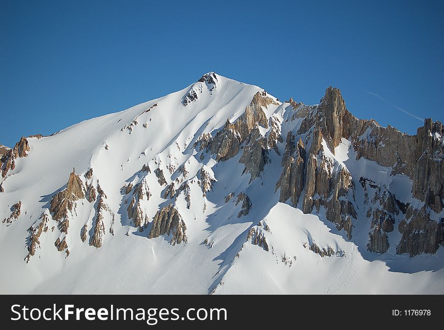 Snow-covered mountain peak, Argentina